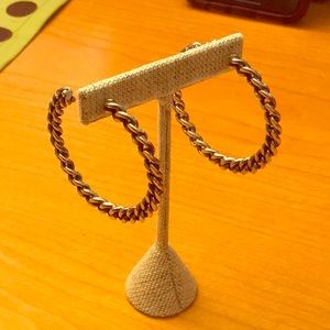 Sterling silver chain hoop earrings.